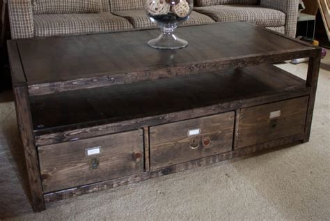 A chunky farmhouse diy coffee table with a space underneath for storage baskets to keep your living room clean and tidy. 21 Free DIY Coffee Table Plans You Can Build Today