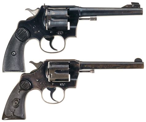 Two Colt Double Action Revolvers A Colt Shooting Master