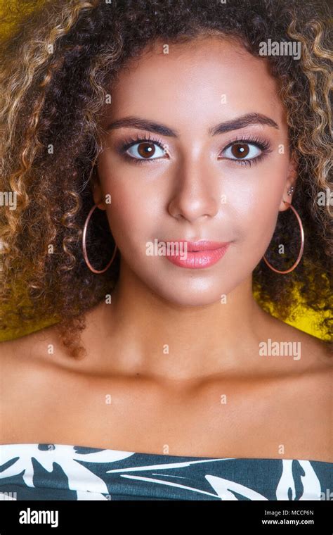 Beauty Portrait Of Young African American Girl With Afro Hairstyle