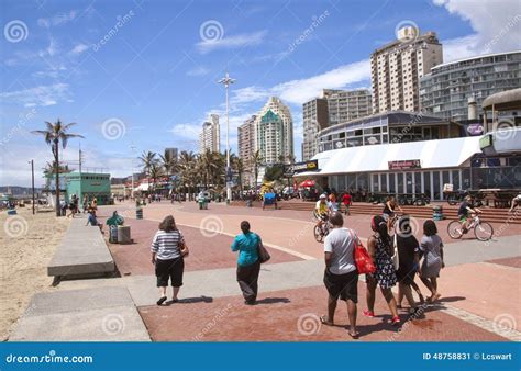 Pedestrians And Cyclists On Promenade Of Beach Front Editorial Photo