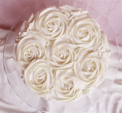 The white roses were all . Three White Cakes