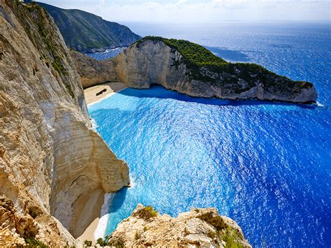 Crystal Blue Water At Shipwreck Beach Attracts Natgeotravel
