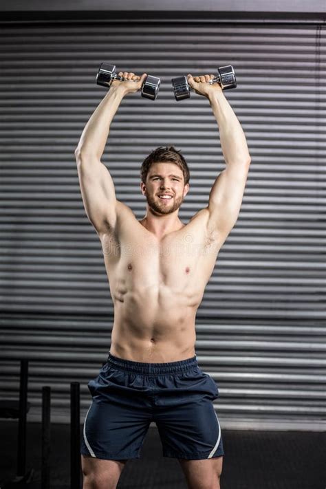 Front View Of Smiling Man Lifting Weight Stock Photo Image Of Biceps