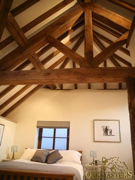 I would like to install a wood ceiling with open rafters and tongue and groove wood all painted white. King post trusses and open vaulted ceilings - Oakmasters
