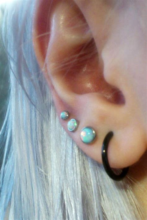 Dazzle Opal Ear Piercing In Opalite Ear Piercings Triple Lobe Piercing Ear Piercing Combinations