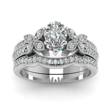 Milgrain Petal Pear Diamond Wedding Ring Set In 950 Platinum