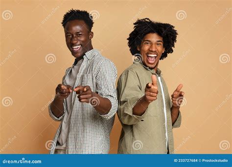 Gotcha Two Cheerful African American Guys Poiting Fingers At Camera
