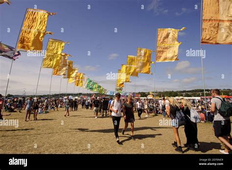 Festival Goers Enjoy The Hot Weather At The Glastonbury Festival At