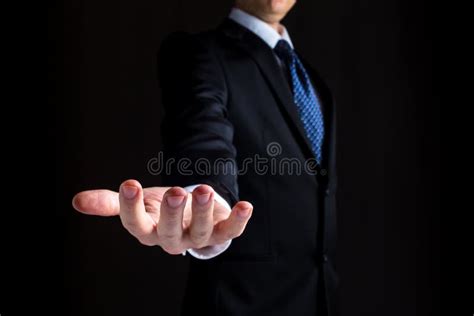 Man Holding His Hand Out And Showing Something Stock Photo Image Of