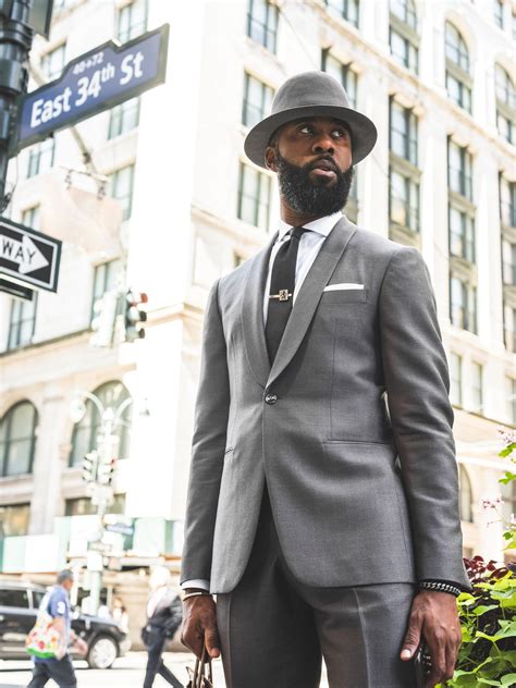 man-wearing-gray-suit-with-hat-2963037 | Redpoint Global