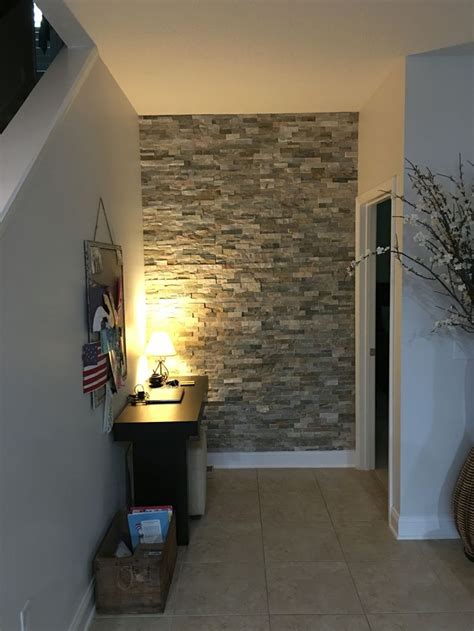 If you're looking for a more subtle way to add stone, then a stone backsplash in the kitchen is classic. Completed stone accent wall using Lowe's Desert Quartz ...