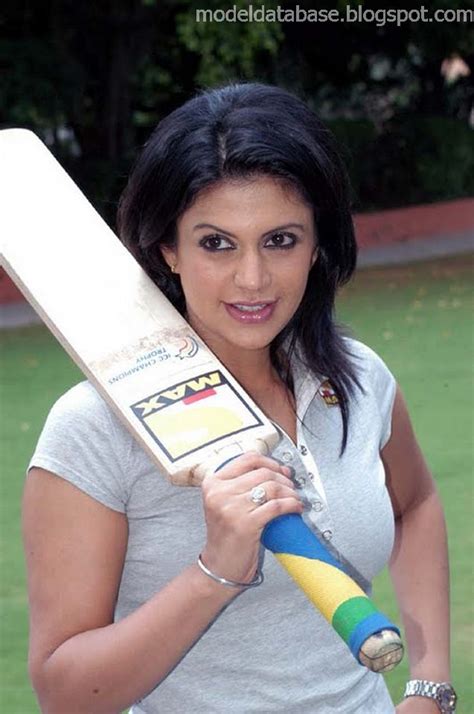 Glamorous Tv Host Mandira Bedi Flashing Her Cricketing Skill In An Event