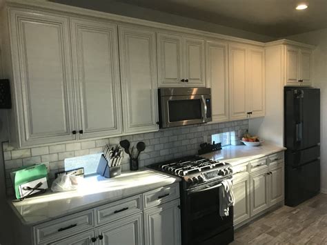 A kitchen (without appliances) costs at least $3,000 before labor. Antique White Raised Panel Cabinets | Premium Cabinets