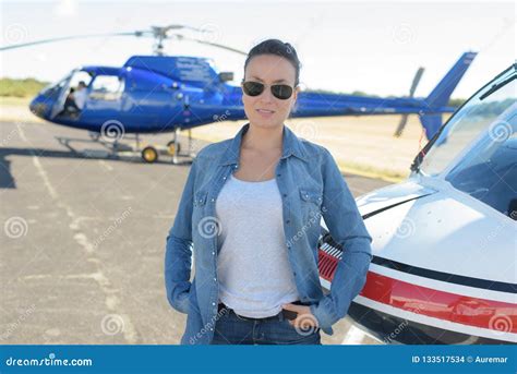 Pretty Pilot Woman On Helicopter Background Stock Photo Image Of