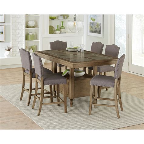 Place setting with red charger. Progressive Furniture Keystone Transitional 7-Piece Counter Height Dining Table Set with Storage ...