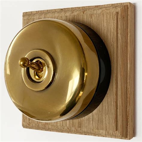 Round Dolly Light Switch 1 Gang Renovated Brass Black Base Broughtons