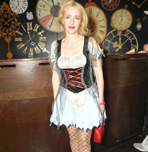 Gillian Anderson Stuns Onlookers In Raunchy Wench Costume And Fishnets