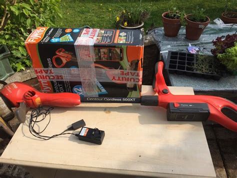 FREE OF CHARGE -Flymo contour cordless 500xt strimmer - needs new ...