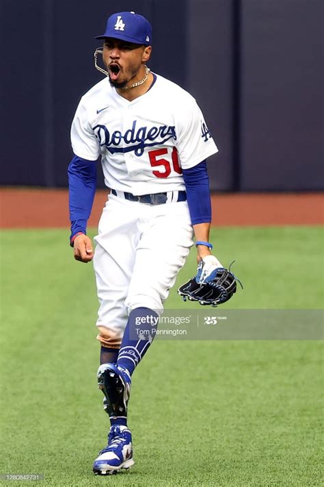 Mookie Betts Of The Los Angeles Dodgers Celebrates After Catching A