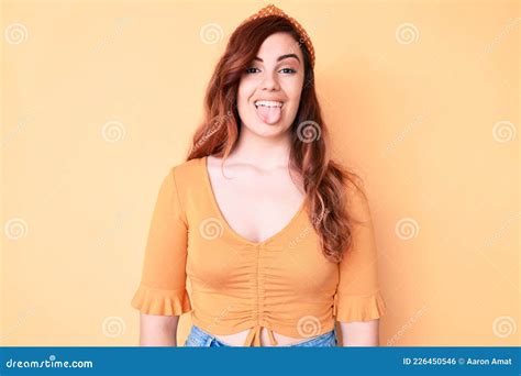 Young Beautiful Woman Wearing Casual Clothes Sticking Tongue Out Happy With Funny Expression