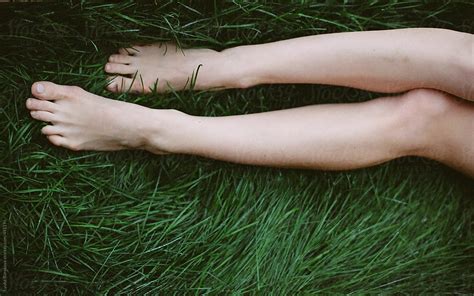 Bare Feet On The Grass Del Colaborador De Stocksy Amor Burakova Stocksy