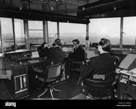 Air Traffic Controllers In The Control Tower At Manchester Ringway