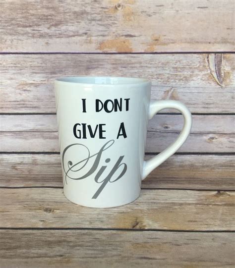 A White Coffee Mug With The Words I Dont Give A Sip On It