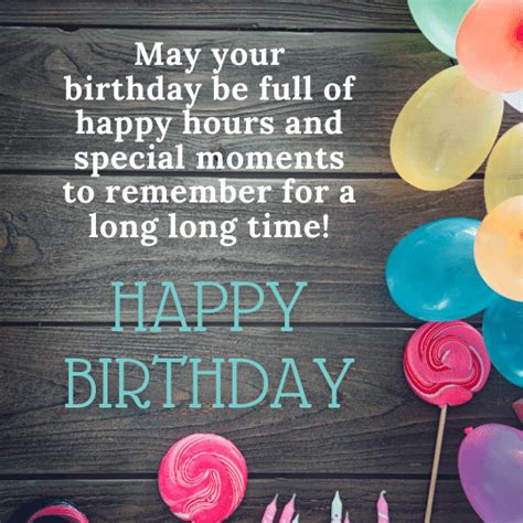 A Birthday Card With Lollipops And Balloons On A Wooden Background That