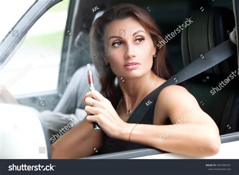 Pretty Woman Smoking Ecigarette While Driving Stock Photo 1807980781