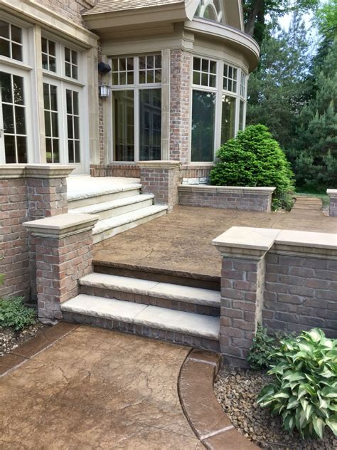 Stamped Concrete Pool Deck With Custom Chiseled Stone Cantilevered Coping By Sierra Concrete