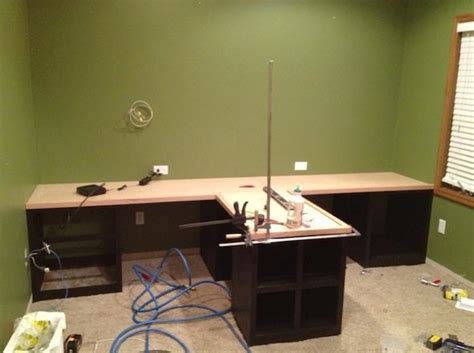 It offers a durable an aesthetically pleasing solution that is the. DIY Office with T- shaped Countertop and Built-in Cabinets ...