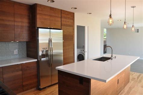 Cabinets are built using hardwood solids and plywood, and both. walnut veneer kitchen cabinets modern - Google Search ...