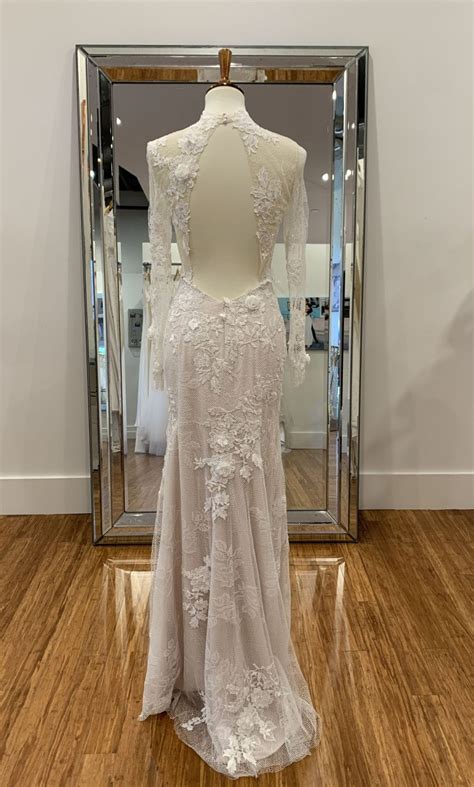 Designers typically take three to six months to construct a gown after receiving the order. Chic Nostalgia Halo Wedding Dress | Sample, Size: 4, $315