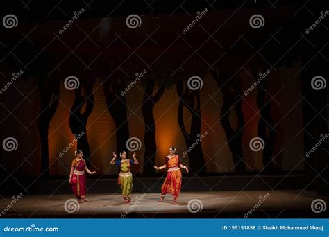 Group Of Female Folk Odissi Dancers Performing Odissi Dance On Stage