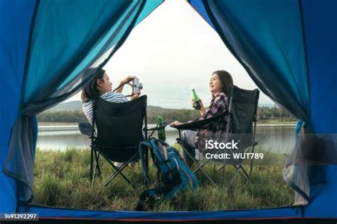 Asian Lgbtq Couples Drinking Drinks In A Romantic Atmosphere Inside A