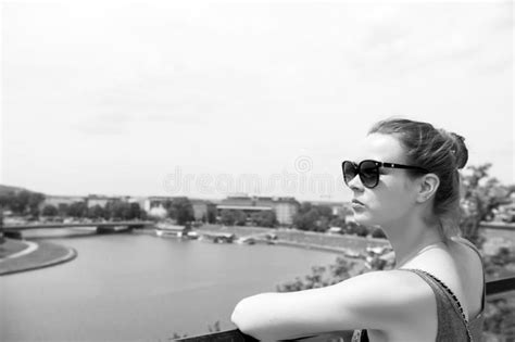 woman look at vistula river in krakow poland sensual woman in sunglasses on sunny day stock