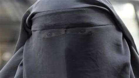 after banning burqa in xinjiang china says forcing others to wear extremist garments is a