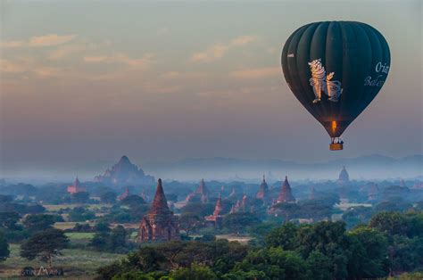 A glorious sunrise over bagan with balloons dotted over the horizon. Hot Air Ballooning in Bagan: Balloons Over Bagan vs ...