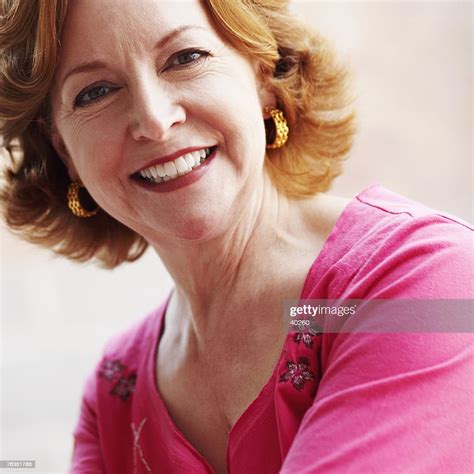 Portrait Of A Mature Woman Smiling High Res Stock Photo Getty Images