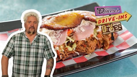 Guy Fieri Eats A Patacon Beef Sandwich Diners Drive Ins And Dives Food Network Youtube