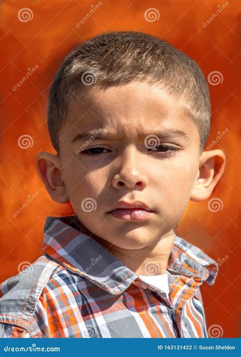 Defiant Expression On A Young Boy Stock Photo Image Of Cute Look