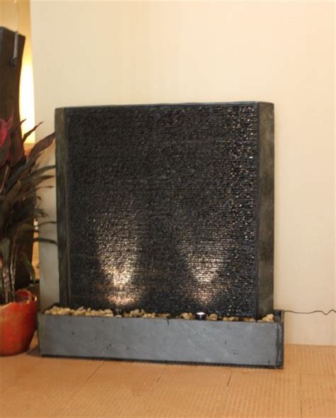 This fountain is made of glass fiber reinforced concrete, which means it will last a lifetime, but weighs in at only 290 lbs. Acrylic/Granite STONE WALL WATERFALL