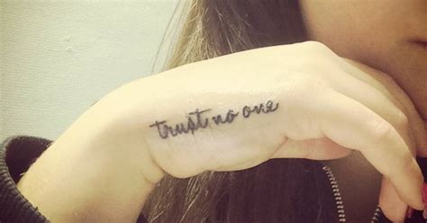 Mum and dad and i all got the same tattoo | circle of love/trust making memories and ticking things off their bucket list. "Trust no one" tattoo on the hand.