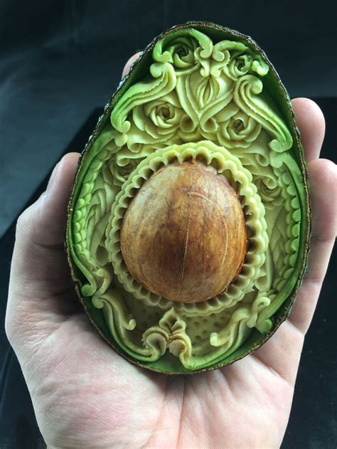 Using a sharp skewer or a small drill, put four holes in the shape of a small square in the center of each slice. This Avocado Took Me Only 1 Hour To Hand-Carve | Bored Panda