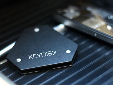 Keydisk The Worlds Thinnest Most Intelligent Key Holder By Keydisk