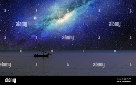 Fishing Boat Sails Under The Milky Way At Night Stock Photo Alamy