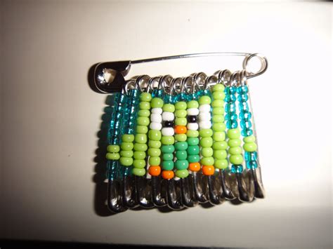 Owl beaded safety pin | Safety pin jewelry, Safety pin crafts, Beaded safety pins