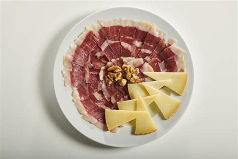 plate of serrano ham and manchego cheese stock image image of iberico jamon 194496325