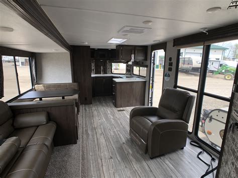 Booth (makes bed) sofa type. 2019 Cherokee 274VFK Front Kitchen Travel Trailer - Tri ...