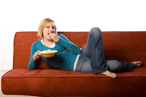 Woman Eating On Couch Royalty Free Stock Image Image 2256646